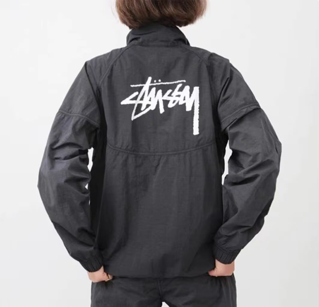 ナイキ ステューシー NIKE × STUSSY WINDRUNNER CT4310-045 ナイロンジャケット コラボ ハーフジップ男女兼用コート